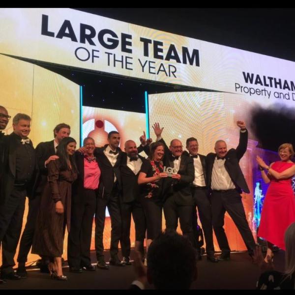 Property and Delivery Team on stage receiving their trophy at the LGC awards in June 2023